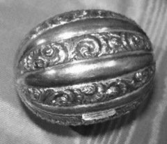 nutmeg grater in the form of a nutmeg