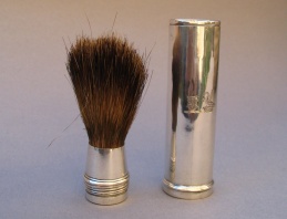 Georgian silver shaving brush with crest