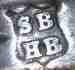 SB over HB into a shield mark, Samuel Biggin & Son, Sheffield 1902