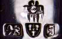 J over ?A over LTD into a four lobed shape mark, Jay, Richard Attenborough & co, Chester 1934