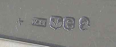 Hallmarks on a spoon assayed at Edinburgh in 1810/11 showing a Journeyman's mark