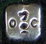 the 'knight' chess figure in a square box between two letters 'O' and 'C'