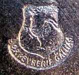 coat of arms with a Gallic cock inside mark