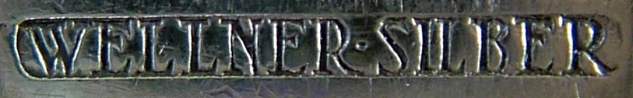 Fragment of a Wellner cutlery mark found on the Art Nouveau ladle